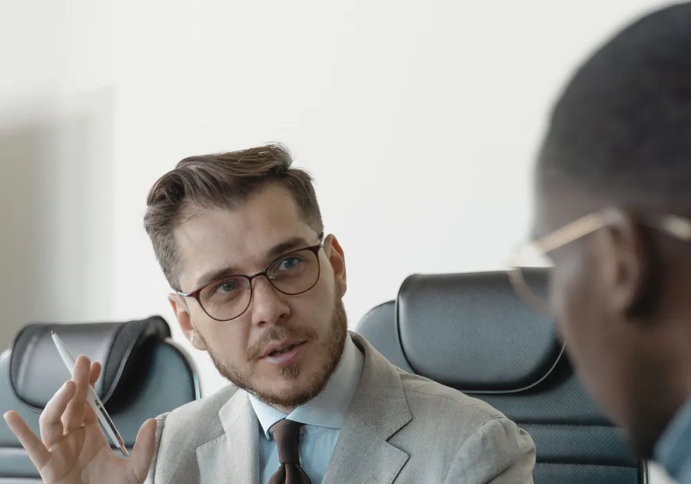Hiring manager speaking with a candidate during an interview